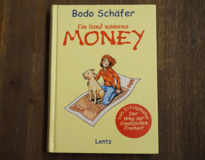Ein Buch über Geld und Finanzen."Ein Hund namens Money" von Bodo Schäfer. Auflage 4, 2000.